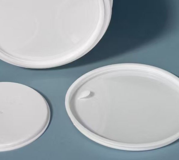 Inner lids and sealing gaskets for cosmetic jar spill protection