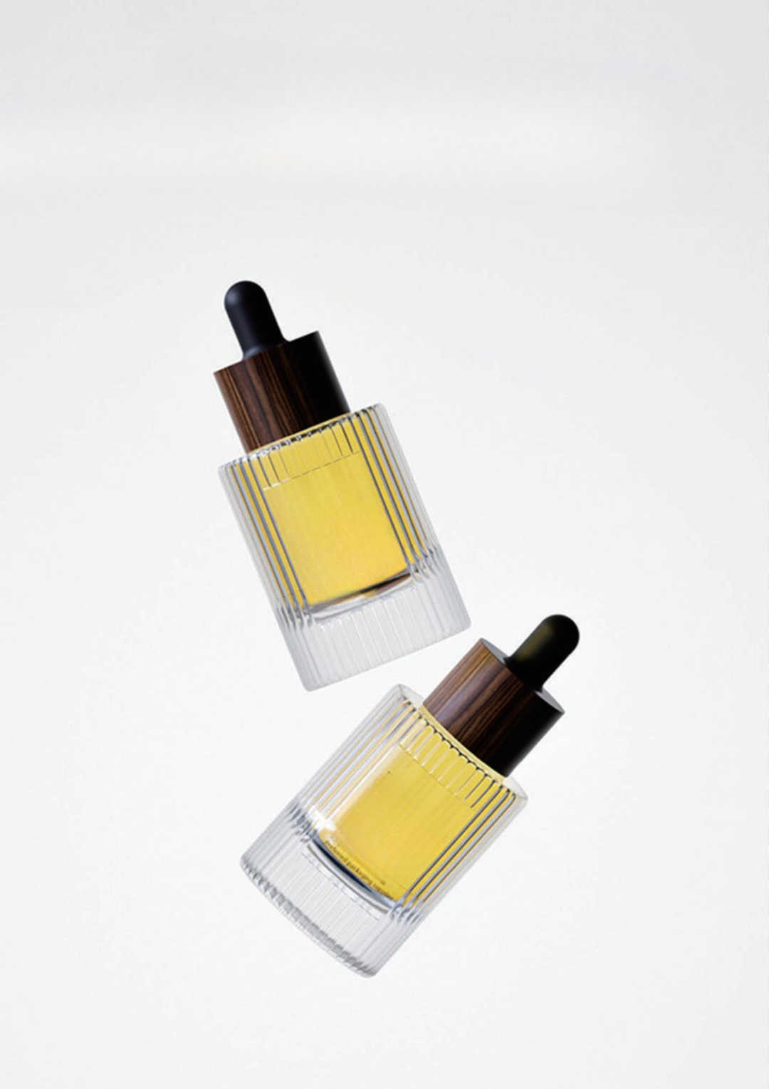 Serums and spot treatment sample packaging in glass tubes